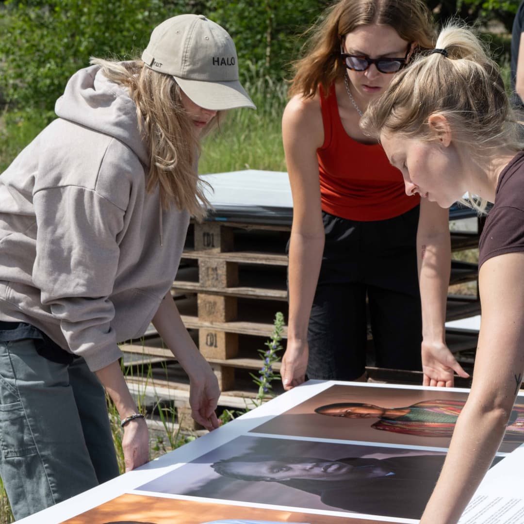 Volunteers helping students